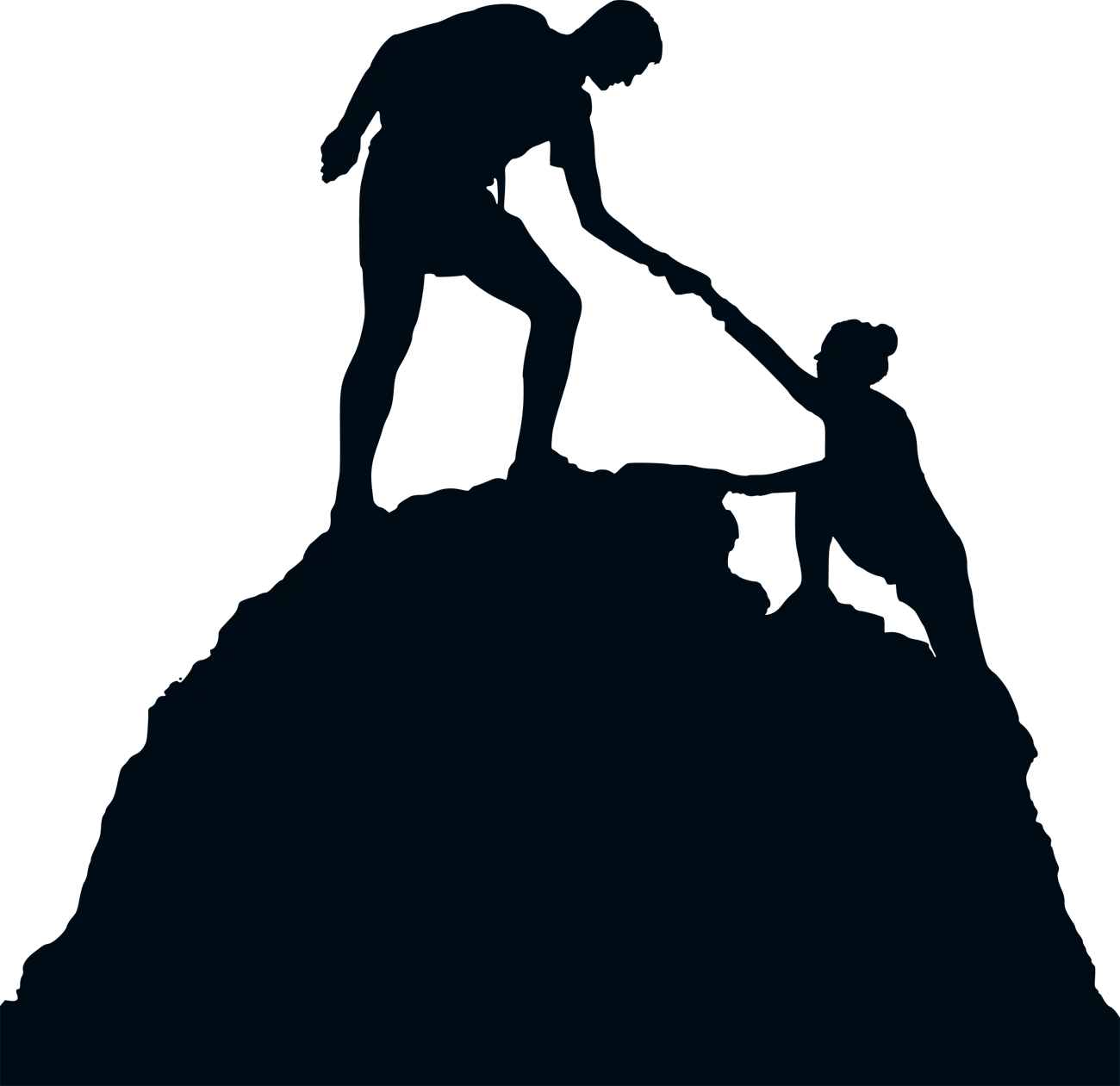 Silhouette: one person helping another climb the mountain